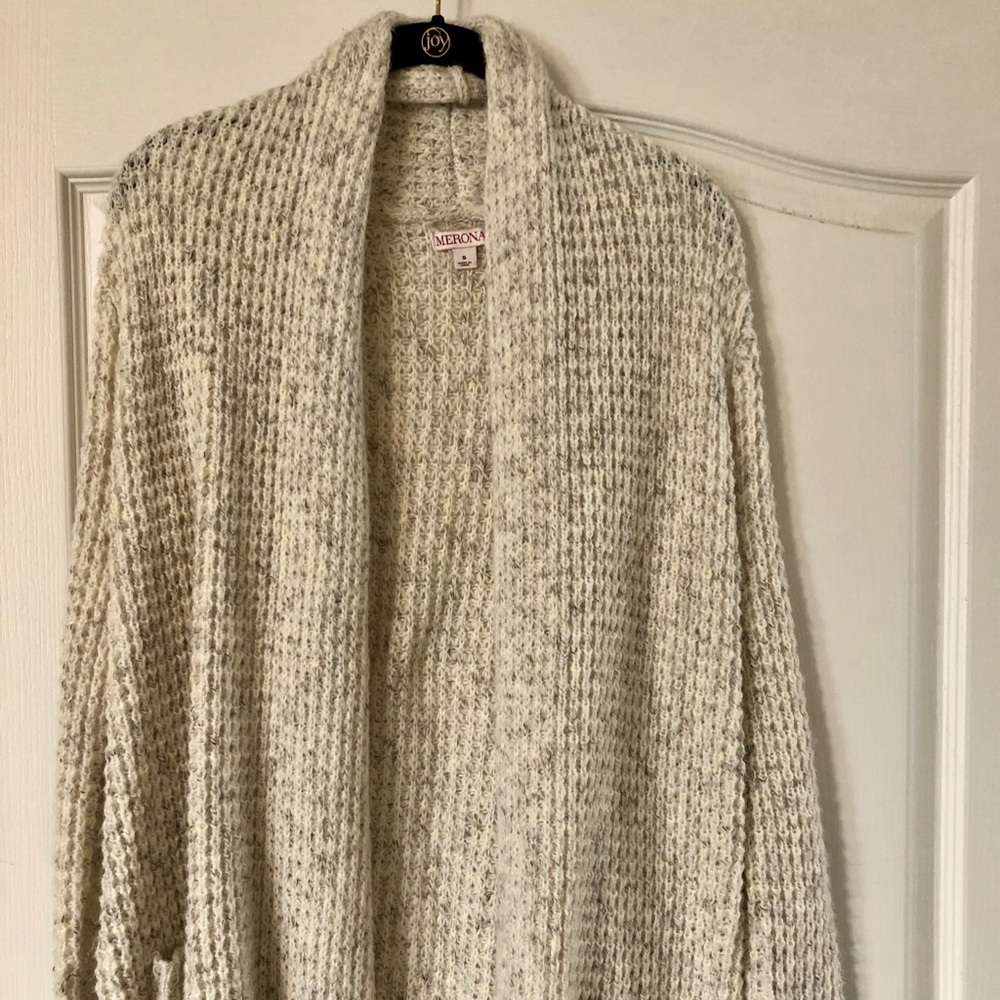Cream colored waffle knit cardigan.